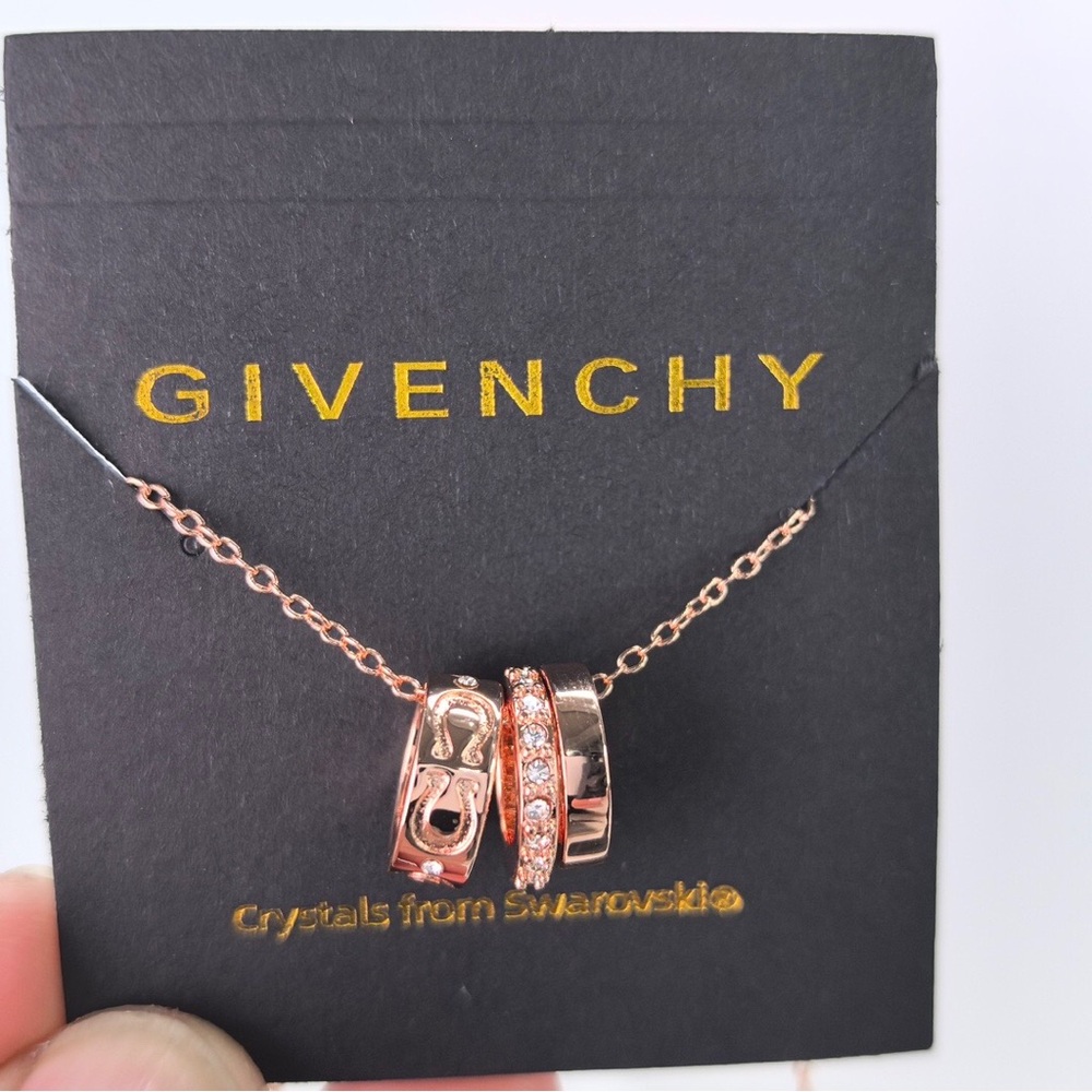 Coach Rose Gold Triple Ring Pendant Necklace with Crystals